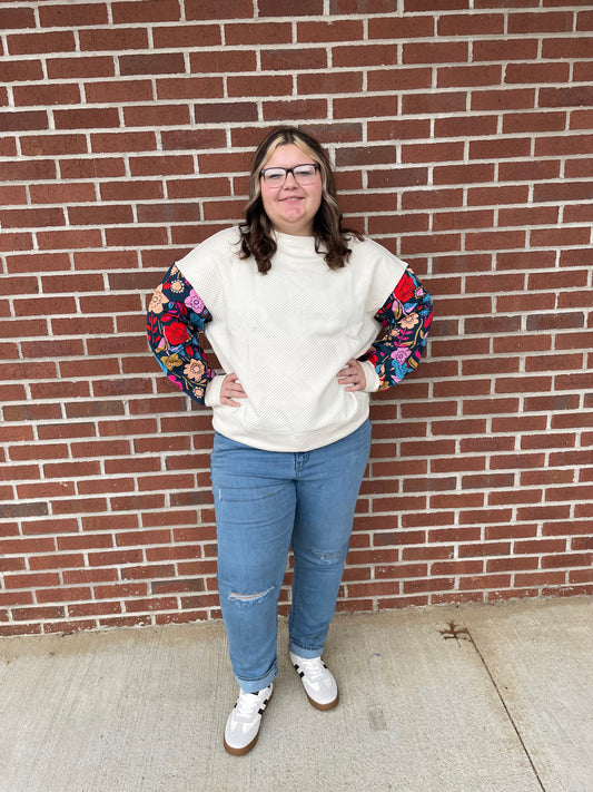 Ivory quilted top with floral sleeves